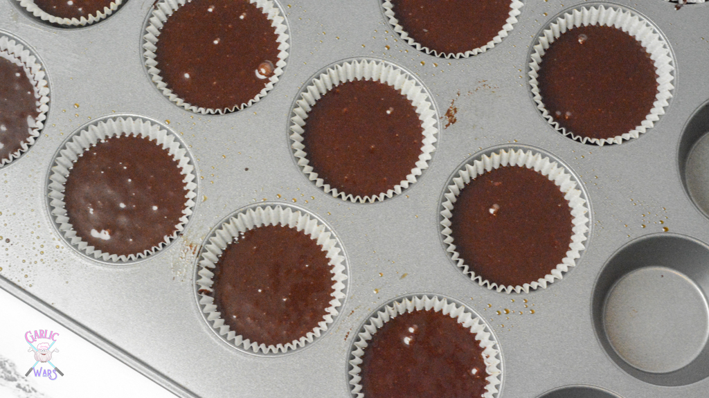 chocolate cake batter in cupcake pan