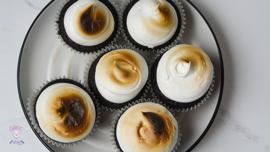 overhead shot of smores cupcakes that shows burnt marshmallow frosting