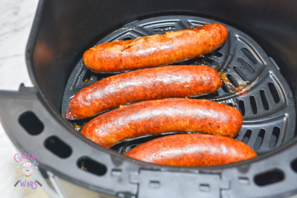 cooked sausage in the air fryer basket