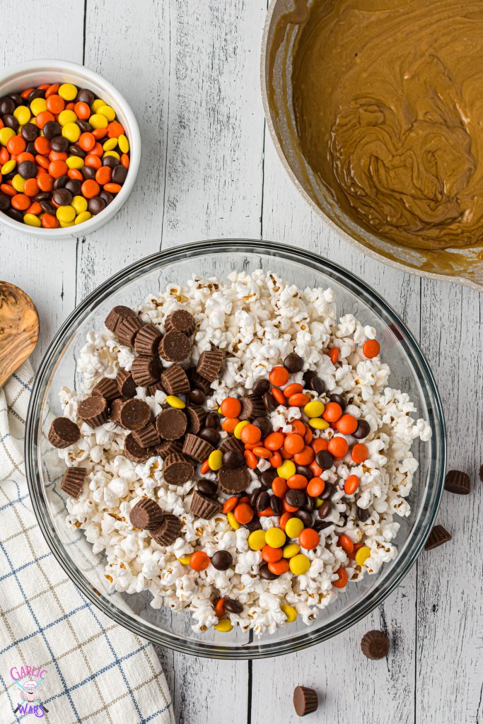 popcorn and candy in large mixing bowl